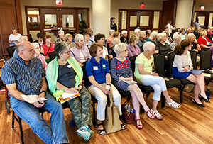 Participants listening to speaker