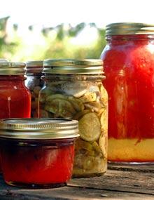 Various sized home canned products.