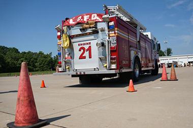 Firetruck in a cone driving course.