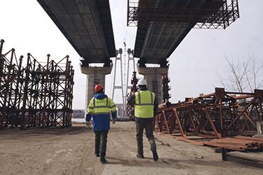 Construction workers working on a new bridge