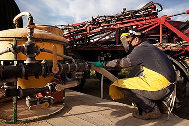 Man working with pesticide