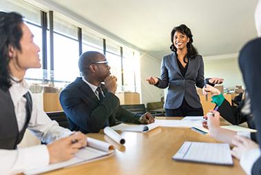 Supervisor talking to her employees