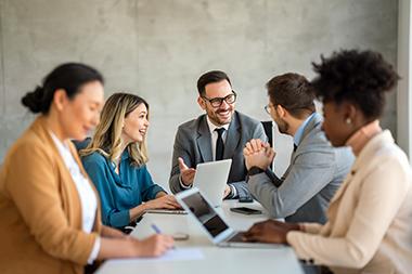 Group of professionals working on comuters