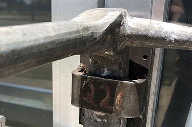 A bolt lock on a door.