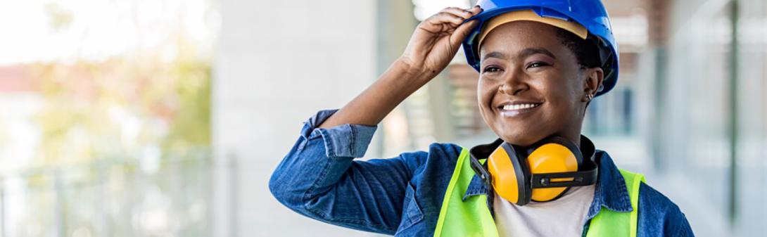 A woman wearing a hard hat.