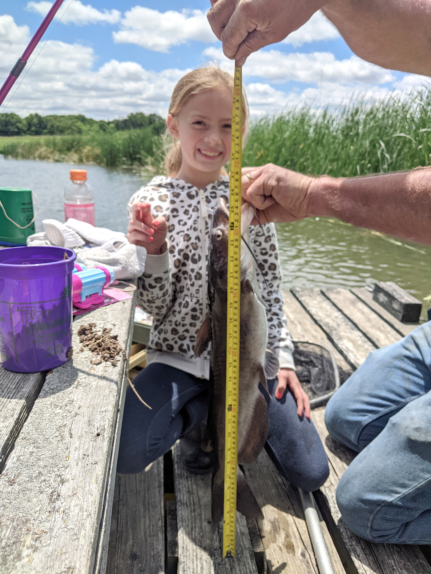 Montgomery County 4-H'er Kendra Stille and her 26-inch channel catfish, the Missouri state fish.