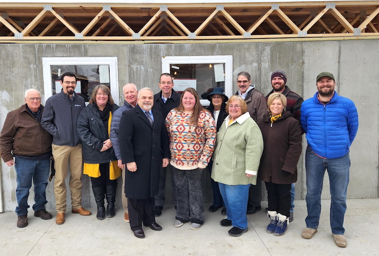 MU Extension officials and county council members recently gathered with MU Vice Chancellor for Extension and Engagement Marshall Stewart (back center) to recognize the Monroe County Commission for its help in securing federal stimulus money to help with 