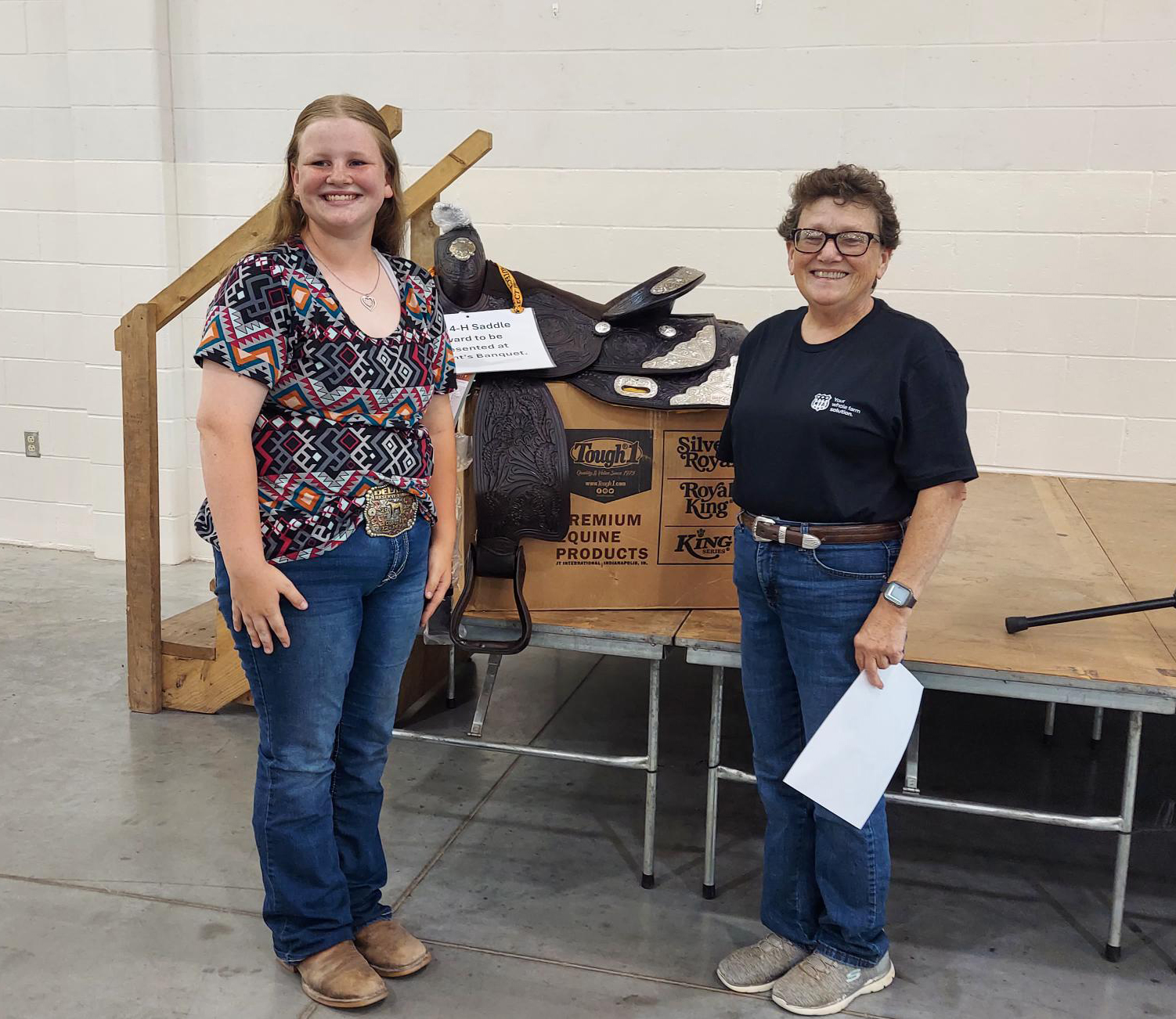 Delaney Duncan, left, of Cass County, received the MFA Saddle Award from MFA Inc. at a recent Missouri 4-H equine event in Sedalia.