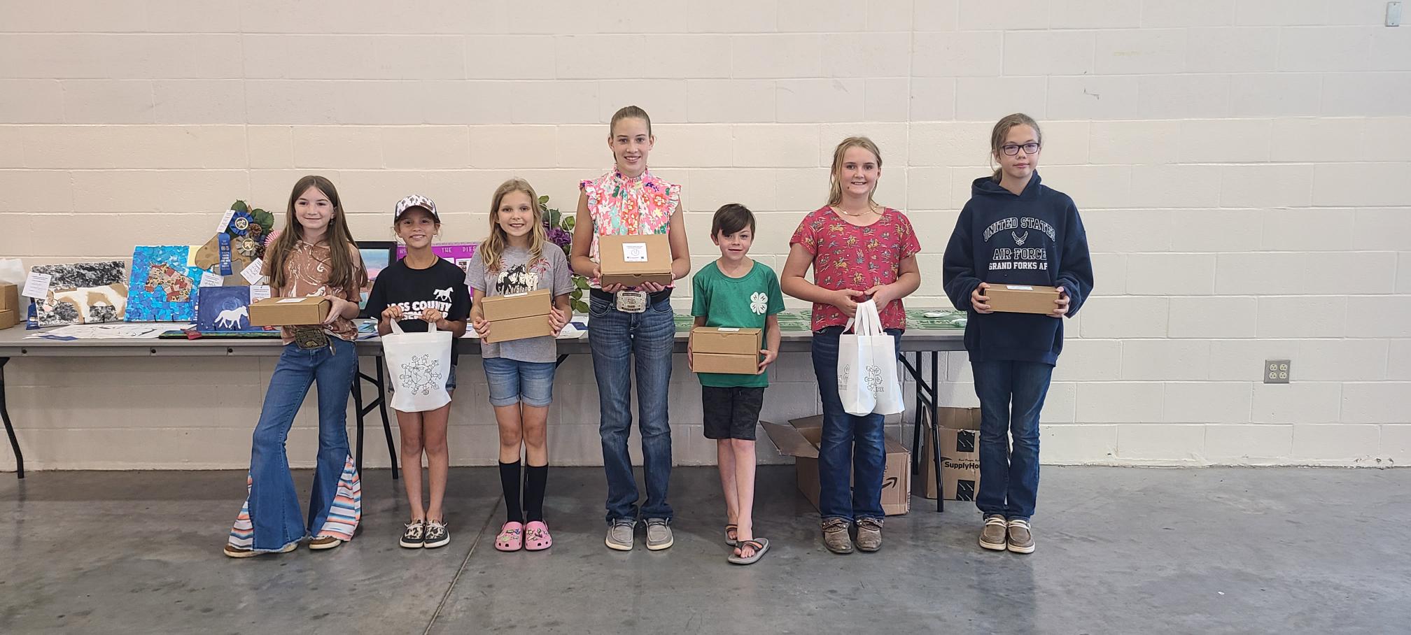 Fine arts winners, from left, Eleanor Smith, Grace Maxwell, Avery Spears, Faith Engemann, Elijah Eaton, QuinnLynne Clark, Siohban Owens.