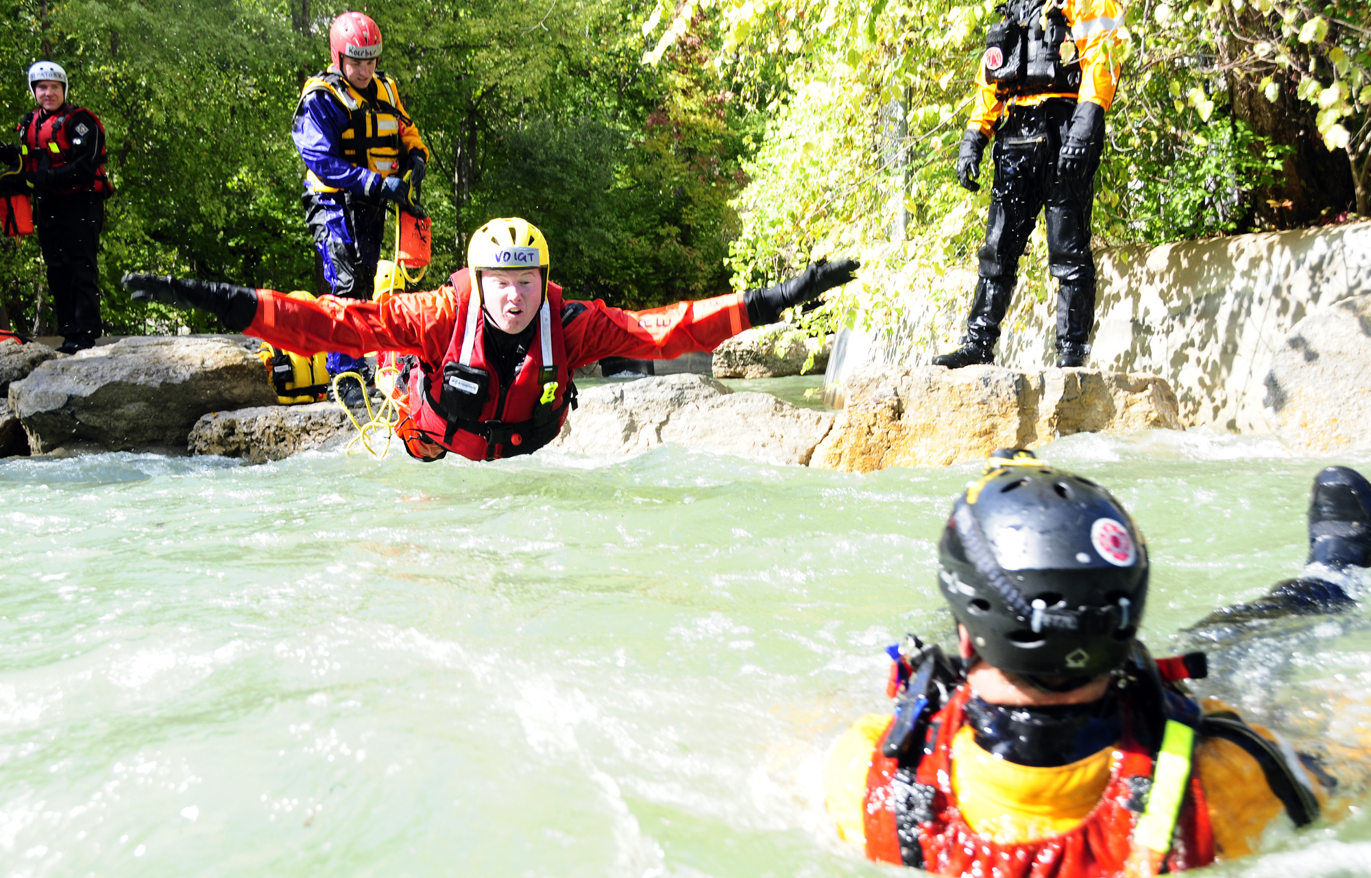 Students participate in several hands-on learning scenarios, including the "live bait" drill where a rescuer jumps in to secure a victim being swept downriver by swift currents. Kent Faddis/MU Cooperative Media Group