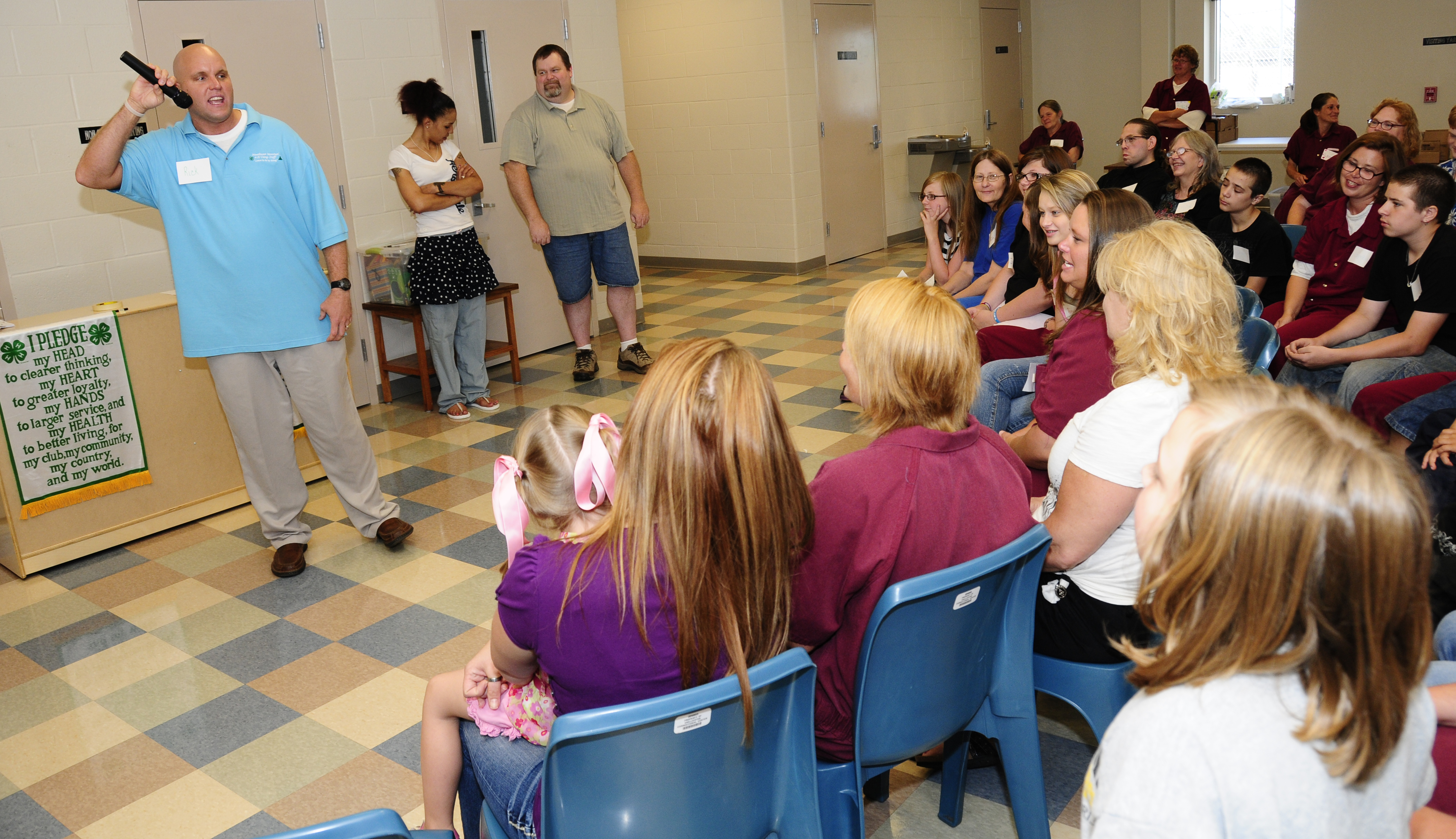 Rick Smith, MU Extension 4-H LIFE mentoring program educator, engages a group of inmates and children during a 4-H club meeting in the Chillicothe Correctional Center. The meetings create a learning environment where parents can take leadership roles and Roger Meissen/MU Cooperative Media Group