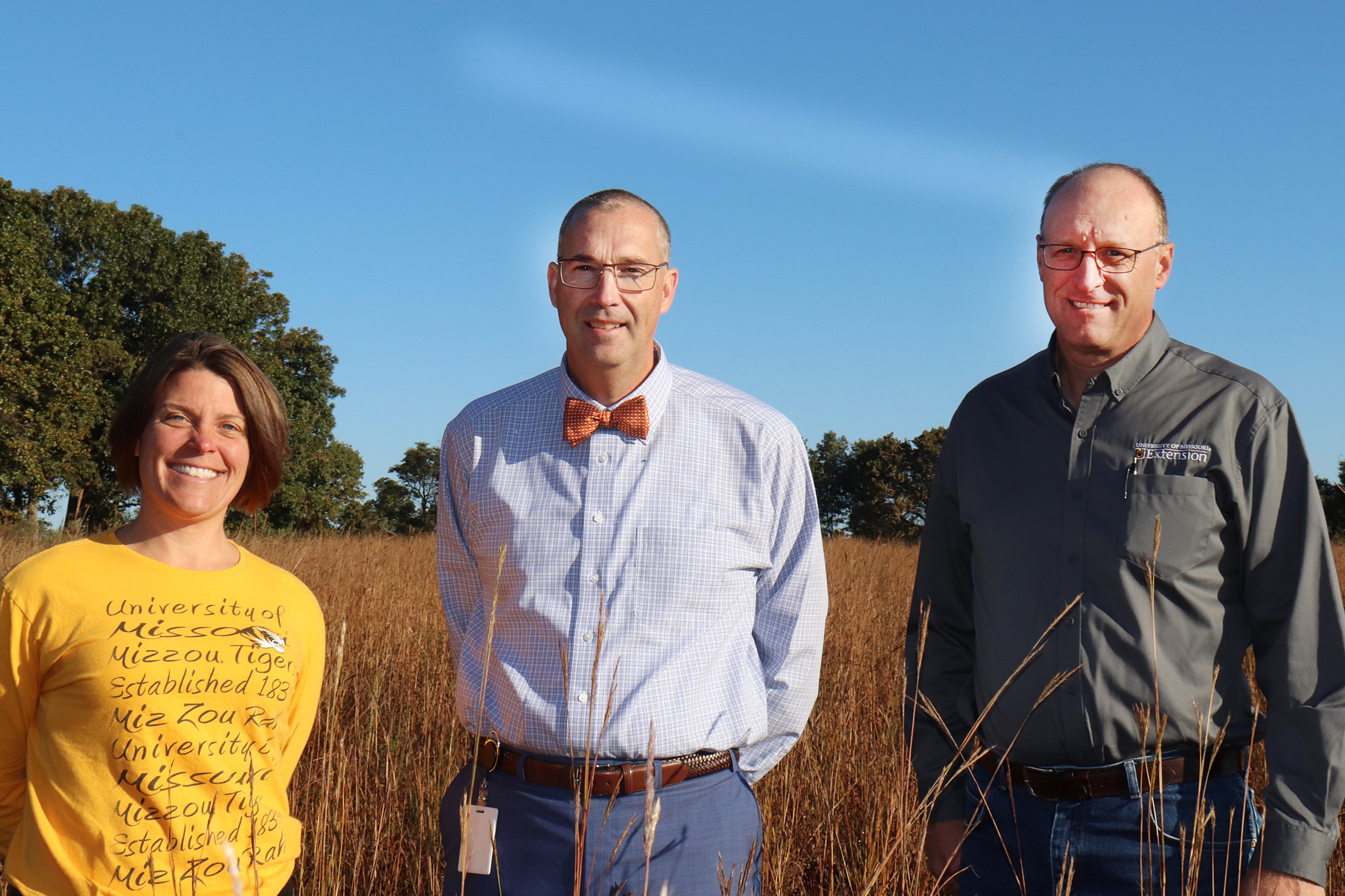 From left, MU Extension dairy specialist Reagan Bluel, farmer Richard Asbill and MU Extension agronomist Tim Schnakenberg at Asbill’s farm in southwestern Missouri. Asbill is also superintendent of the Cassville R-IV School District. Photo by Linda Geist.