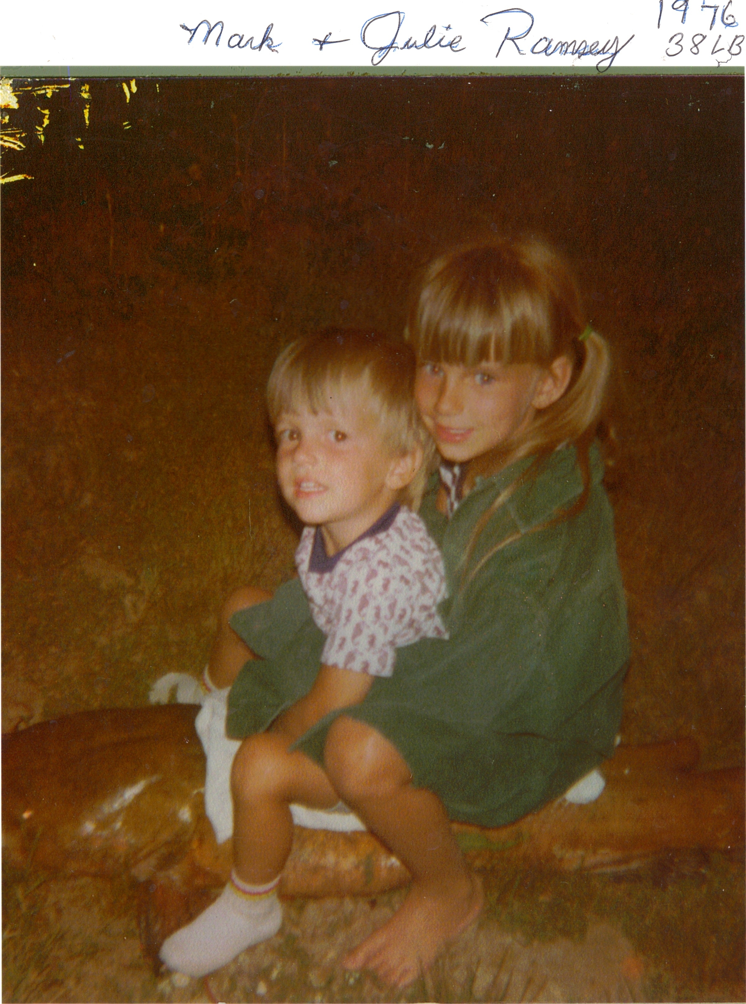 Mark, left, and Julie Ramsey sit astride a 38-pound catfish in 1976.Photos courtesy of Mark Morgan and the Ramsey family