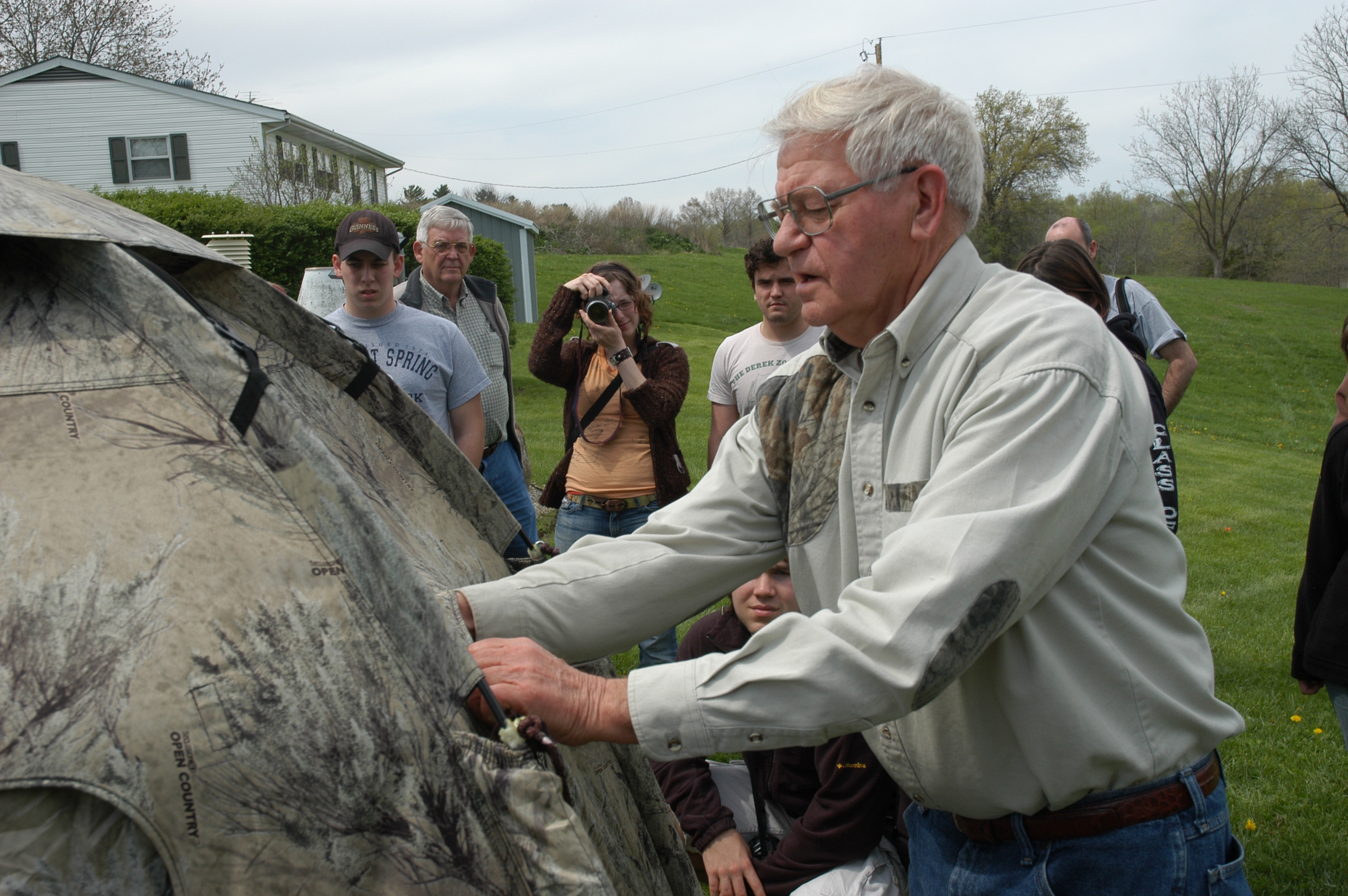 Photographer Glenn Chambers demonstrates his photographer's blind to MU students at an outdoor photography workshop organized by students in MU's School of Natural Resources.Photo by Curt Wohleber